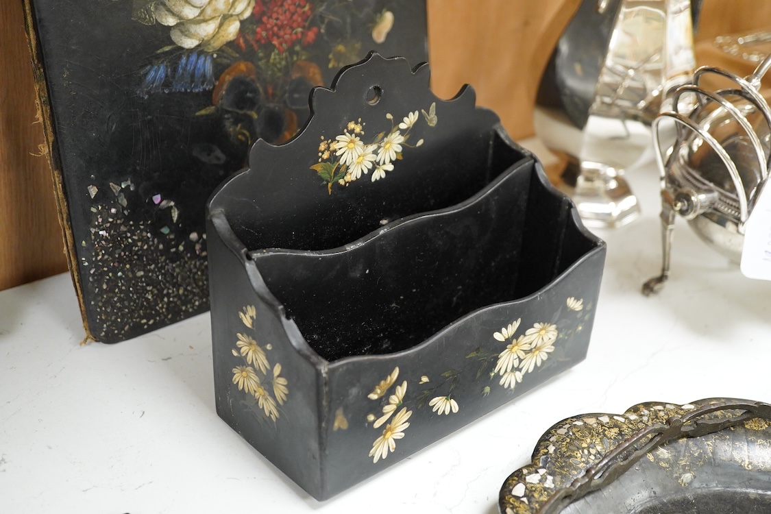 A collection of Victorian papier maché to include an inkstand, a pair of Victorian mirrored wall brackets and a swing handled dish, largest 30cm high
